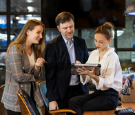 Office Discussion with Three Employees