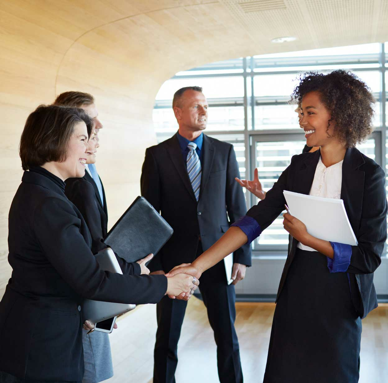 Employee Welcoming a New Employee