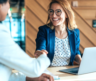 Business people shaking hands in the office during a job interview